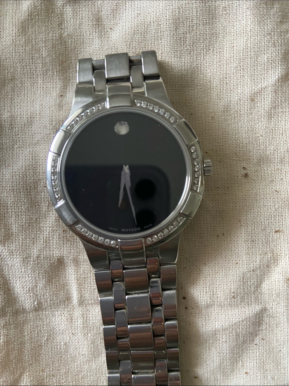 Movado Men’s Silver Stainless Steel Watch with Black Dial and Crystal Bezel